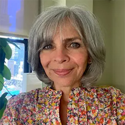 Headshot of Odette van der Willik.